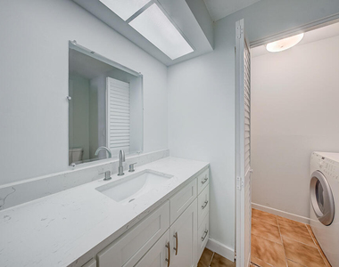 12037 Basin Street N - Photo Thumbnail 11