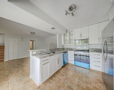 12037 Basin Street N - Photo Thumbnail 10
