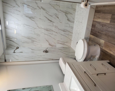8070 N Nob Hill Road - Photo Thumbnail 9