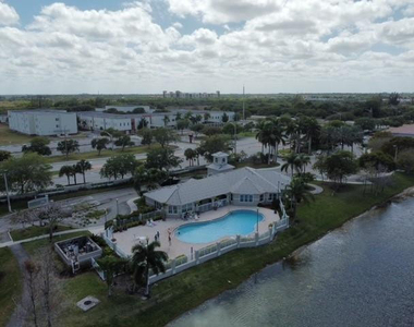 5051 Wiles Road - Photo Thumbnail 16