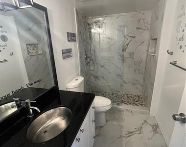 5051 Wiles Road - Photo Thumbnail 8