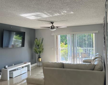 5051 Wiles Road - Photo Thumbnail 1