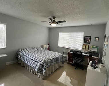 5051 Wiles Road - Photo Thumbnail 11