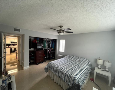 5051 Wiles Road - Photo Thumbnail 12
