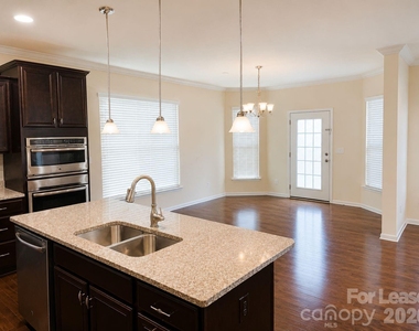 10665 Sky Chase Avenue Nw - Photo Thumbnail 4