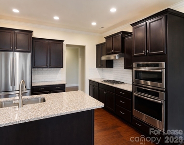 10665 Sky Chase Avenue Nw - Photo Thumbnail 5