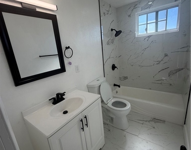 1550 1/2 W 59th Place - Photo Thumbnail 5