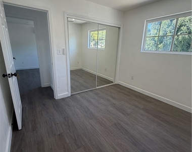 1550 1/2 W 59th Place - Photo Thumbnail 12