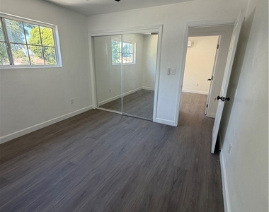 1550 1/2 W 59th Place - Photo Thumbnail 10