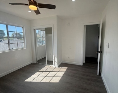 1550 1/2 W 59th Place - Photo Thumbnail 9