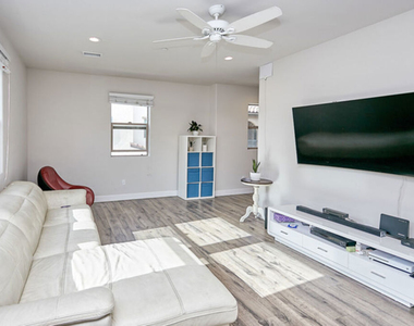 9831 Alburtis Avenue - Photo Thumbnail 9