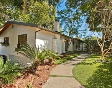7586 Woodrow Wilson Drive - Photo Thumbnail 1