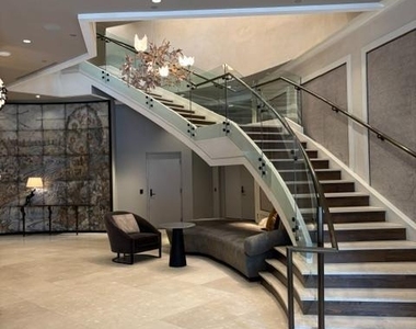 7171 Woodmont Avenue - Photo Thumbnail 2