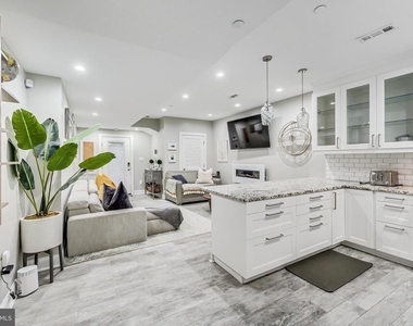 1343 Irving Street Nw - Photo Thumbnail 4