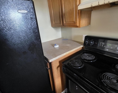 1317 W 15th Street - Photo Thumbnail 6