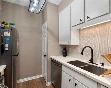10047 Westpark Drive - Photo Thumbnail 2