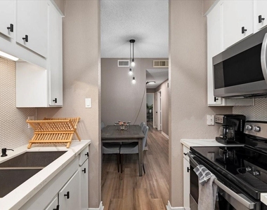 10047 Westpark Drive - Photo Thumbnail 3