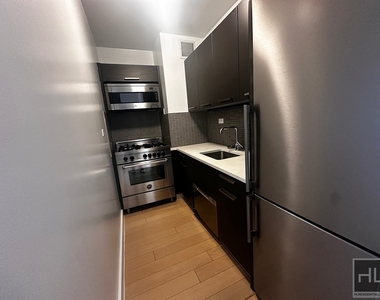 E 39th St - Photo Thumbnail 1