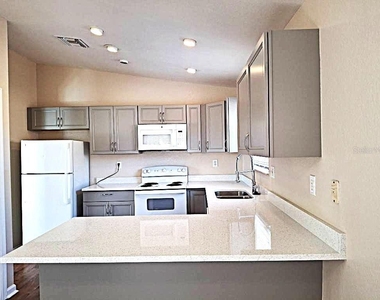 5560 61st Street N - Photo Thumbnail 2