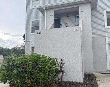 7128 Waterside Drive - Photo Thumbnail 1