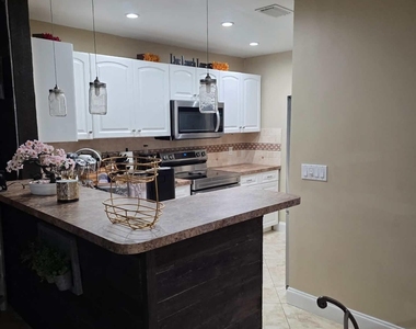 10046 Winding Lake Road - Photo Thumbnail 8