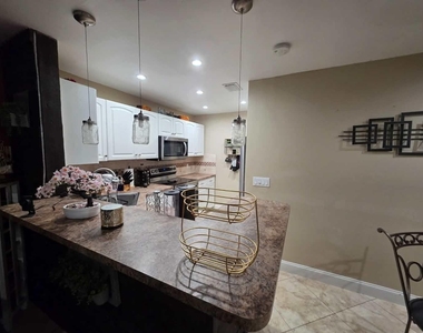 10046 Winding Lake Road - Photo Thumbnail 6