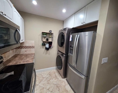 10046 Winding Lake Road - Photo Thumbnail 5