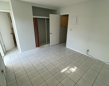 5881 Ne 18th Avenue - Photo Thumbnail 2