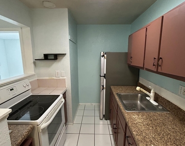 5881 Ne 18th Avenue - Photo Thumbnail 1