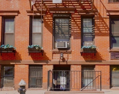 W 53rd St. - Photo Thumbnail 6