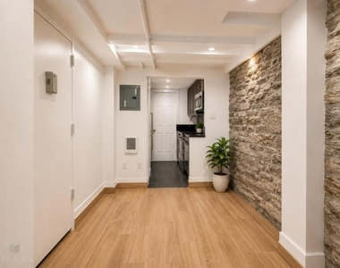 W 53rd St. - Photo Thumbnail 3