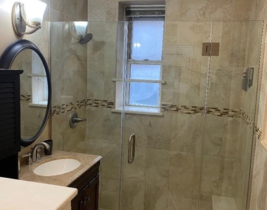 63-60 102nd Street - Photo Thumbnail 5