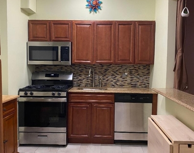 63-60 102nd Street - Photo Thumbnail 2