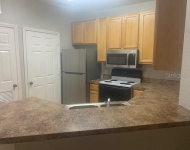 10025 Courtney Palms Boulevard - Photo Thumbnail 10