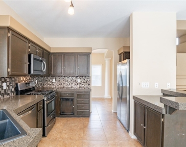 8791 Arawana Place - Photo Thumbnail 8