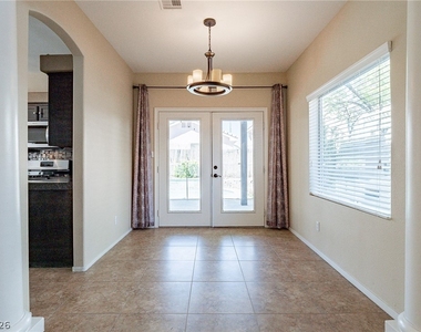 8791 Arawana Place - Photo Thumbnail 2
