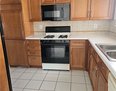 7703 Salishan Drive - Photo Thumbnail 3