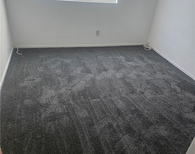 7703 Salishan Drive - Photo Thumbnail 4