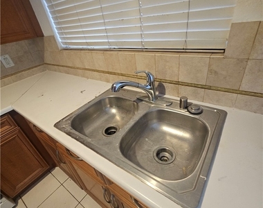 7703 Salishan Drive - Photo Thumbnail 6