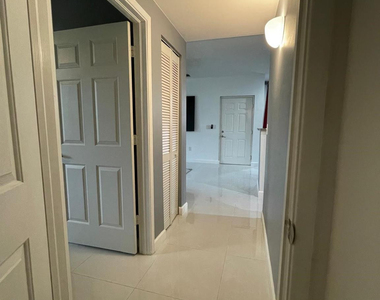 7950 N Nob Hill Road - Photo Thumbnail 12