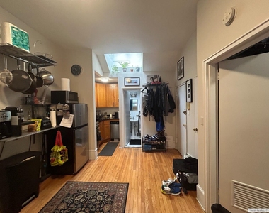 110 E 61st Street - Photo Thumbnail 3