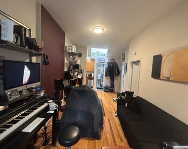 110 E 61st Street - Photo Thumbnail 4