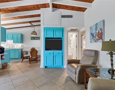 6006 Midnight Pass Road - Photo Thumbnail 4