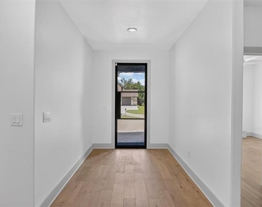 205 E 3rd Street - Photo Thumbnail 2