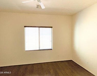 144 S 108th Drive - Photo Thumbnail 6
