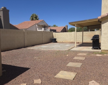 9205 W Villa Rita Drive - Photo Thumbnail 3
