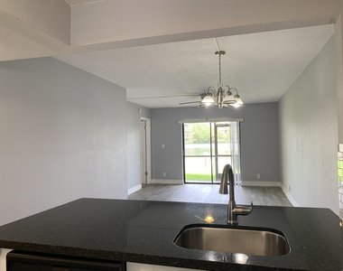 10011 Winding Lake Road - Photo Thumbnail 2