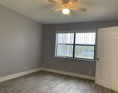 10011 Winding Lake Road - Photo Thumbnail 9