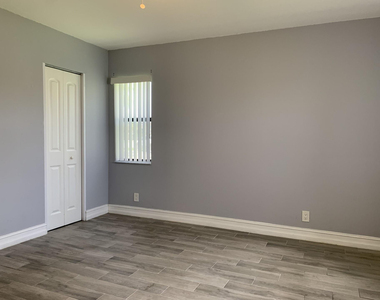 10011 Winding Lake Road - Photo Thumbnail 11