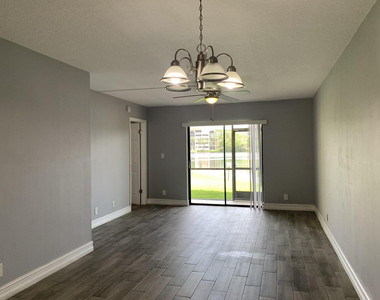 10011 Winding Lake Road - Photo Thumbnail 5